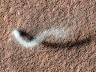 NASA's Mars Reconnaissance Orbiter snapped this photo of a dust devil on the Red Planet on Feb. 16, 2012.