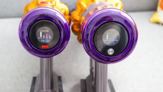 Dyson V12 Detect Slim and Dyson V15 Detect digital displays side by side