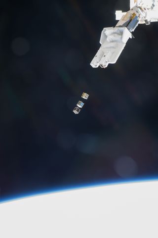 Kibo Laboratory's Robotic Arm Deploys Cubesats