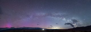 Astrophotographer Shari Hunt was surprised to see aurora in her photographs of the Milky Way taken in California's Death Valley.