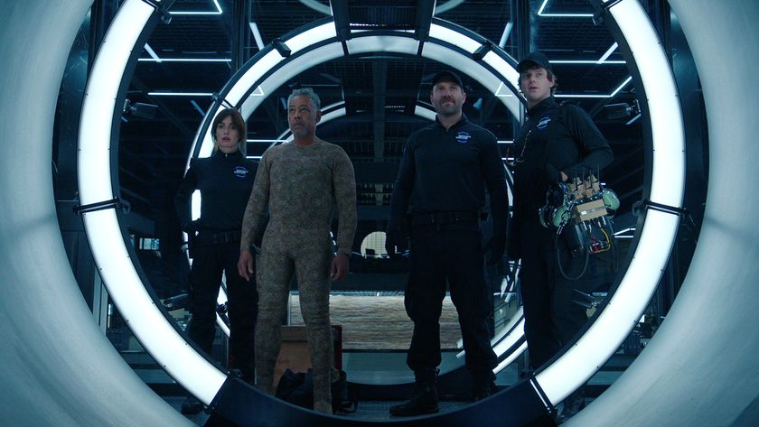 Leo and some other crewmates stand in a vault in Netflix&#039;s Kaleidoscope TV show