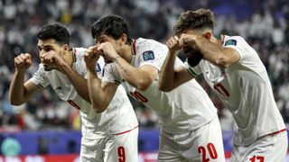 ran&#039;s forward #09 Mehdi Taremi and his forward #20 Sardar Azmoun and midfielder #17 Ali Gholizadeh celebrate ahead of the Iran vs Qatar AFCON semi-final