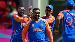 India players celebrate the dismissal of England's Jos Buttler in the T20 World Cup semi-final.