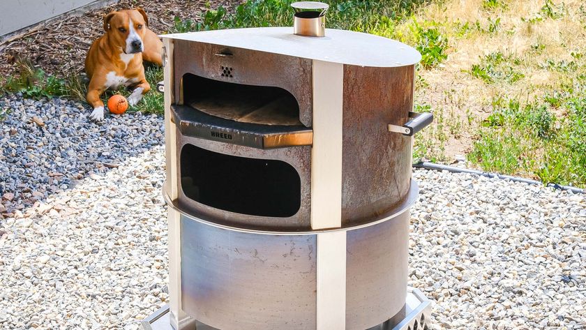 Breeo Live-fire pizza oven bundle in back yard