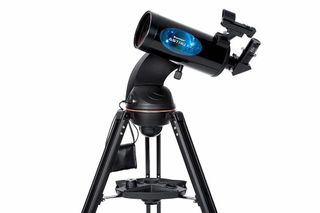 A Celestron telescope on a white background