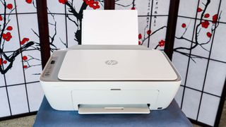 HP DeskJet 2755e on table in livingroom