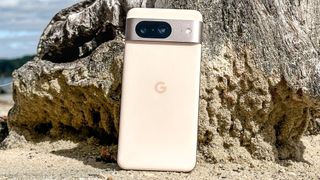 Google Pixel 8 shown held in hand