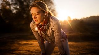 Female runner catching her breath