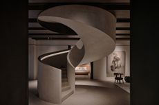 Molteni & C shanghai showroom interiors with brutalist inspired concrete staircase