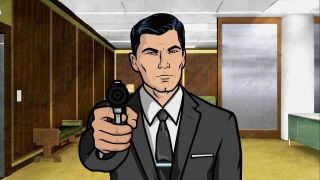 Archer pointing a gun at the camera.