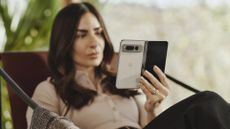 Google Pixel Fold held by woman