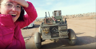 Space.com's Chelsea Gohd admires the back of the "lunar rover" used for the film "Ad Astra."