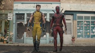 Hugh Jackman's Wolverine and Ryan Reynolds' Deadpool walking through torn-apart street