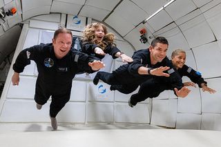 Inspiration4 crew experiences weightlessness during zero-g flight.