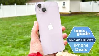 A purple iPhone 14 Plus with a Tom&#039;s Guide Black Friday iPhone deals badge