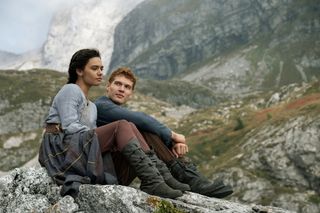 rand and egwene sitting on a mountainside