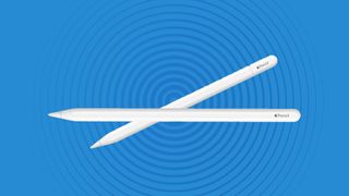 Two Apple Pencils on a blue background