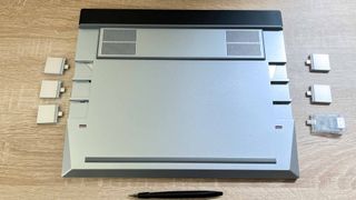 Framework Laptop 16 review unit on table, bottom facing camera