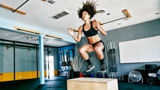 woman doing box jump exercise