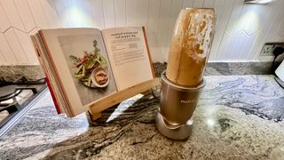 Nutribullet Pro 900 blender being used to prepare walnut dip