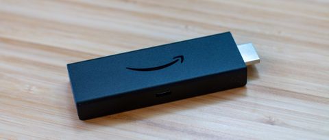 Amazon Fire TV Stick Lite on table 21x9