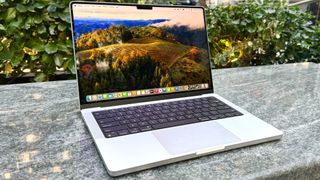 MacBook Pro 14-inch M3 on marble bench 