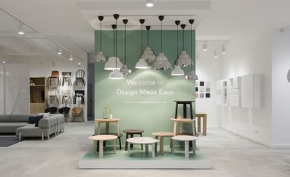 Shop with lights, chairs &amp; side tables on display