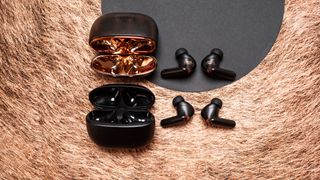 Creative Aurvana Ace 2 earbuds next to Ace