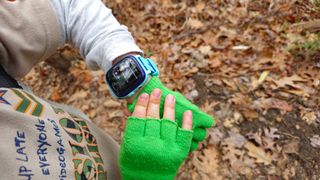 A child wearing the blue Angel Watch Series R