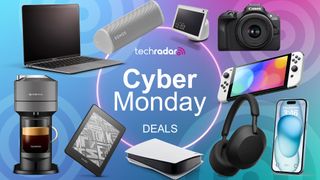 Assorted tech products on blue background with cyber monday deals text overlay