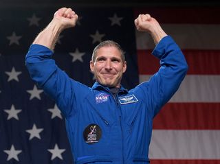 NASA astronaut Michael Hopkins celebrating the announcement in August 2018 that he would be flying to the International Space Station on the first full-fledged mission of the SpaceX Crew Dragon.