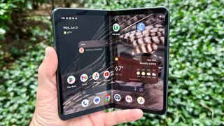 Google Pixel Fold shown in hand