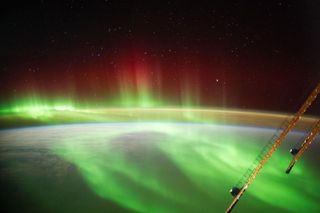 An aurora spotted from the International Space Station. An Oct. 11 geomagnetic solar storm created auroras that stretched as far south as New York.