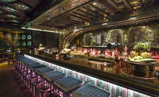 Bar having countertop with stools