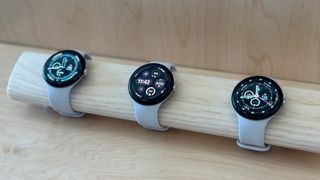 Three Google Pixel Watch 3s on display at the Made by Google 2024 event.