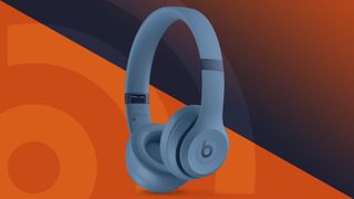 Beats Solo 4 on-ear headphones in blue sit above the techradar logo