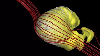 An updated model suggests the shape of the sun’s bubble of influence, the heliosphere (seen in yellow), may be a deflated croissant shape, rather than the long-tailed comet shape suggested by other research.