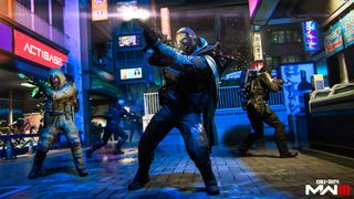 Three Operators fire weapons on the streets of Tokyo. Neon sigs and tall buildings can be seen in the background