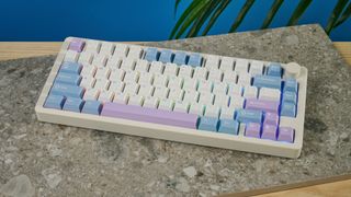 A pink, blue and white Gamakay TK75 Pro wireless mechanical keyboard with hot-swappable linear switches