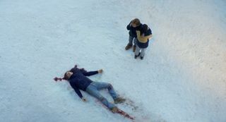 Poster image of man dead in snow with wife and son onlooking