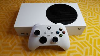 The Xbox Series S console in white, with controller