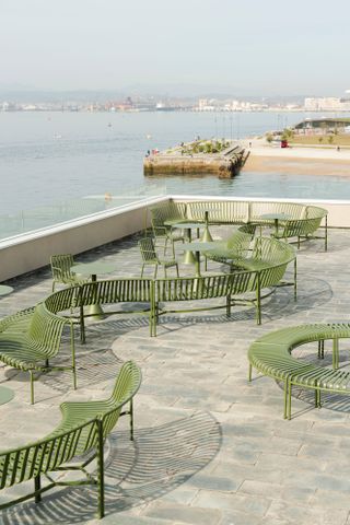 The Cantabrian Maritime Museum Restaurant terrace with green seating