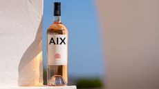 bottle of AIX Rosé in sunshine