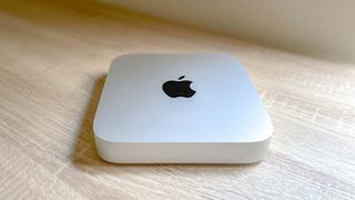 Apple Mac mini M2 on a desk, not plugged into anything