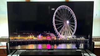 Roku Plus Series TV showing Ferris Wheel onscreen