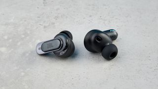 A pair of JBL Tour Pro 2 wireless earbuds in black