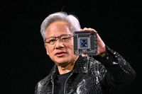 Nvidia CEO Jensen Huang holding a chip