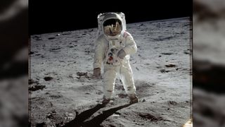 Astronaut Buzz Aldrin walks on the surface of the moon near the leg of the lunar module Eagle during the Apollo 11 mission in July 1969. Mission commander Neil Armstrong took this photograph with a 70-millimeter lunar surface camera.