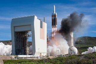 A United Launch Alliance Delta IV Heavy rocket carrying the classified NROL-71 spy satellite for the U.S. National Reconnaissance Office launches toward space from Space Launch Complex-6 at Vandenberg Air Force Base, California on Jan. 19, 2019.