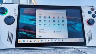 ROG Ally playing Cyberpunk but with Windows 11 menu pulled up.
